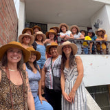 peruvian artisans all in Sun hats