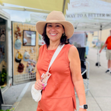 Customer in our beige NATIVO cotton packable Sun hat hand crafted by artisans