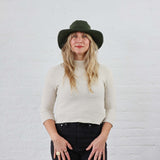 Leaf Green Crochet Cotton Sun Hat modeled on a female, casual every day style