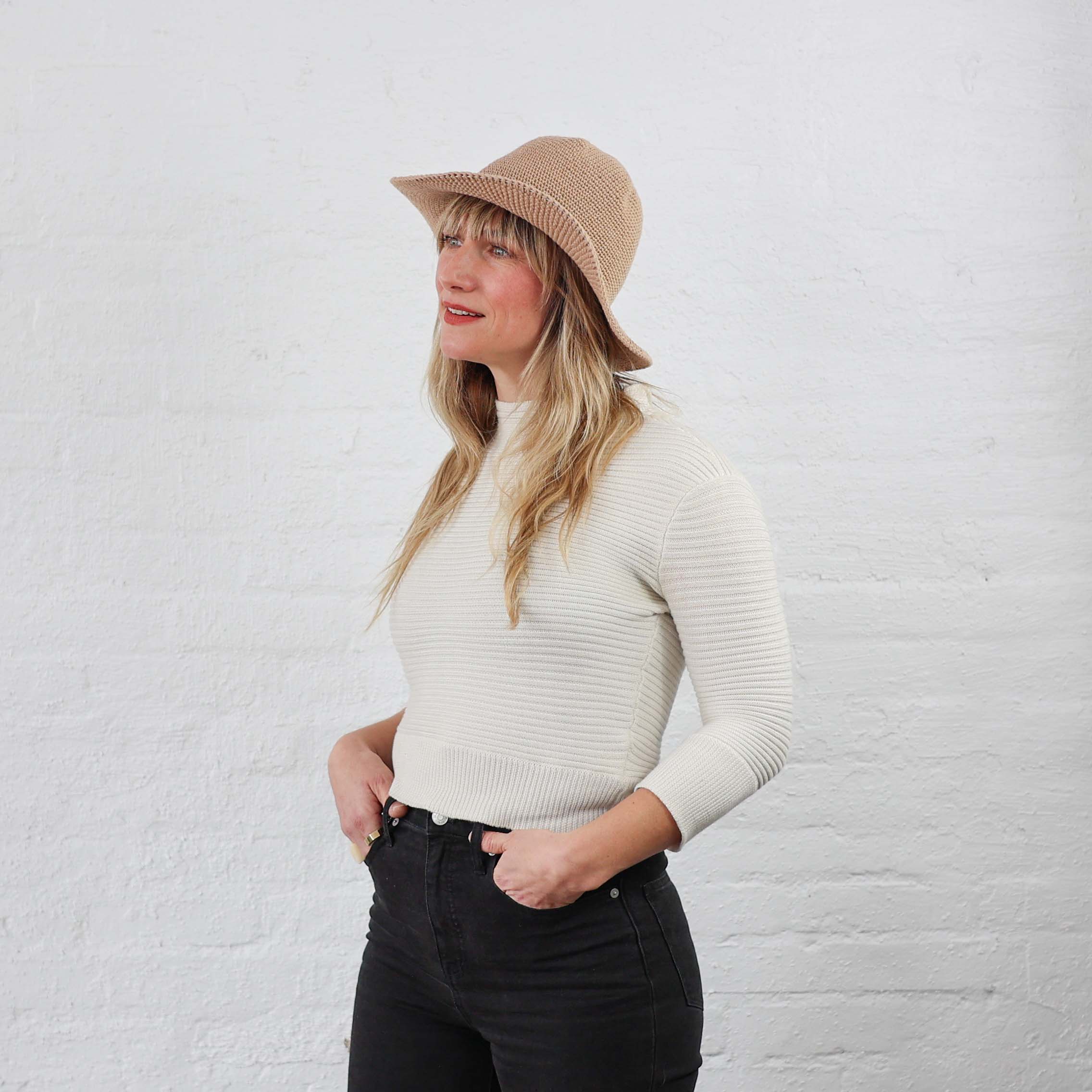 Dye free nude tan Cotton Crochet Sun Hat modeled on a female