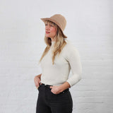 Dye free nude tan Cotton Crochet Sun Hat modeled on a female