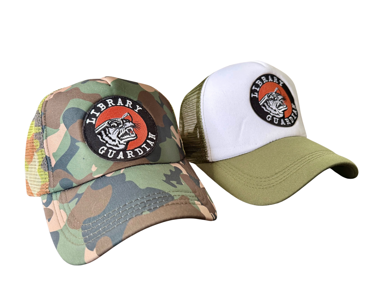 Two hats, one camouflage and one white with green brim, featuring a 'Library Guardian' logo.