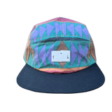 Front View of 5 panel flat brim in 80's Aztec with black brim 