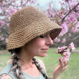 New North Ferry Crochet Raffia Bucket Hat slow fashion small batch sustainable fashion for earth day design companion to the new packable straw hat