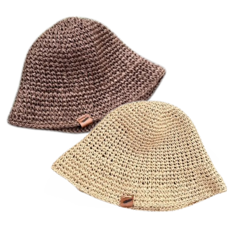 Two Crochet Bucket Hats laying flat, a dark brown option and a light tan option available at North Ferry Hats a relaxed fit for adults and kids and companion product to the new North Ferry Packable Straw Hat