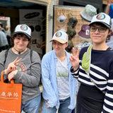 3 Happy Customers all Gender and Ages in their new Trucker Caps, making a statement against fascism and ready for the next Rally or Womens March