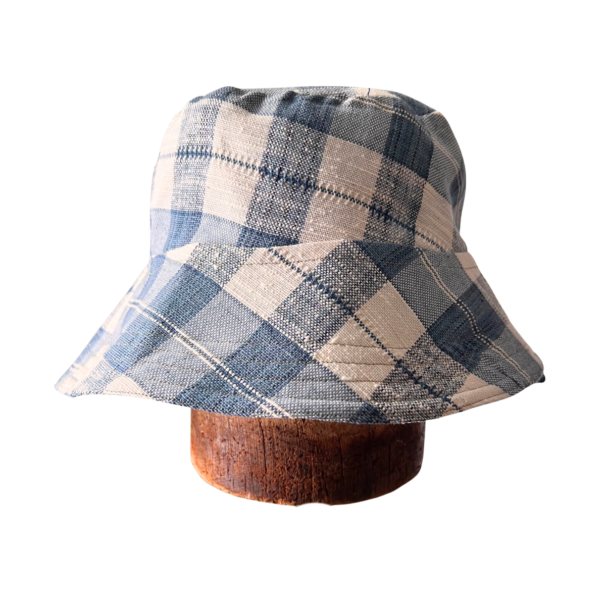 Blue and White gingham fabric bucket hats, hand-made in Ithaca NY using Upcycled Fabrics, Sustainable Woman Owned Brands that makes packable Sun hats bucket hats and beach hats