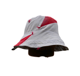 Sewing setup in a wood tiny house overlooking snowy woods scene. Sewing Bucket Hats in February for a sustainable hat company, available in spring reversible waterproof bucket hats and PACKABLE Sun hats made in the finger lakes