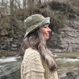 Side Profile of our Reversible Bucket Hat with a flexible brim that can be styled a variety of ways.  A relaxed fit floppy Brim summer Sun hat in recycled prints