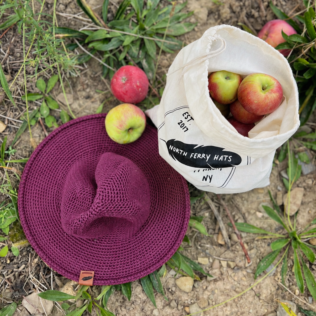 Apple Picking with a North Ferry Packable Sun Hat in Fall and Winter weather