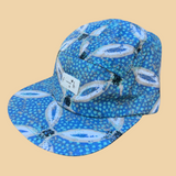 Blue Print 5 panel Flat Brim Hat Ovals with light blue polka dots and hints of black light stitching 