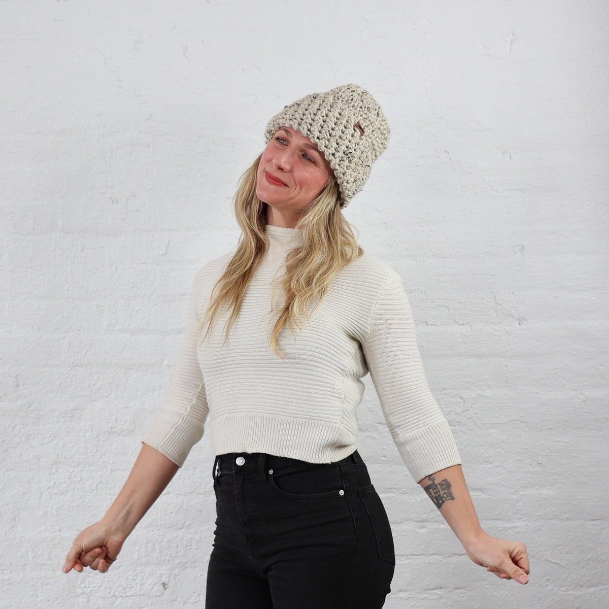 Off White Thick Knit Beanies with folded up Cuff styled on Adult Women